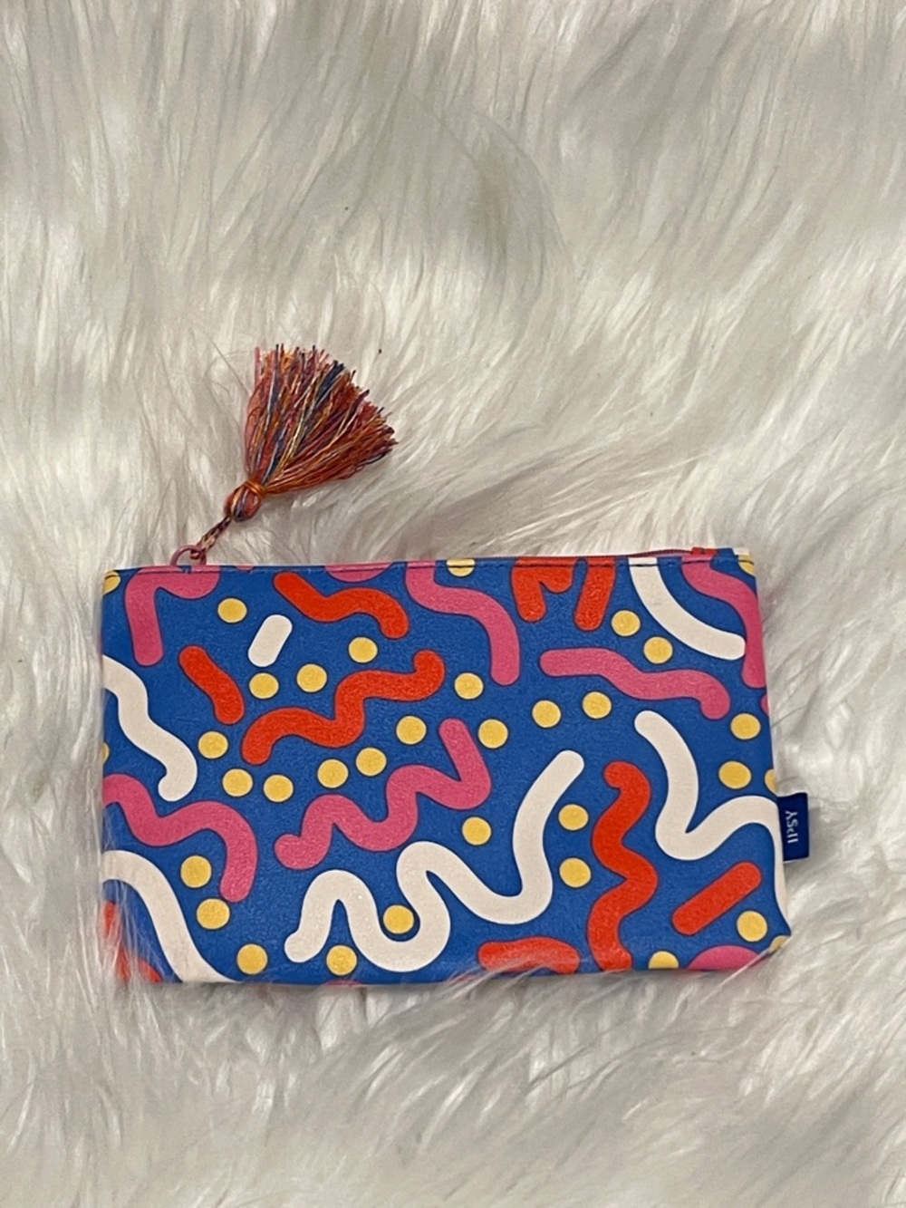 ipsy Blue Pouch with Pink Red Yellow Accents